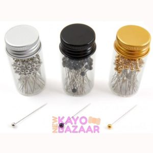 Head pins in glass jar
